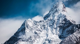 Mountain with snow and mist