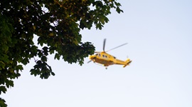 yellow helicopter in the sky
