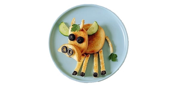 childs food Plate of food arranged to look like a cow.