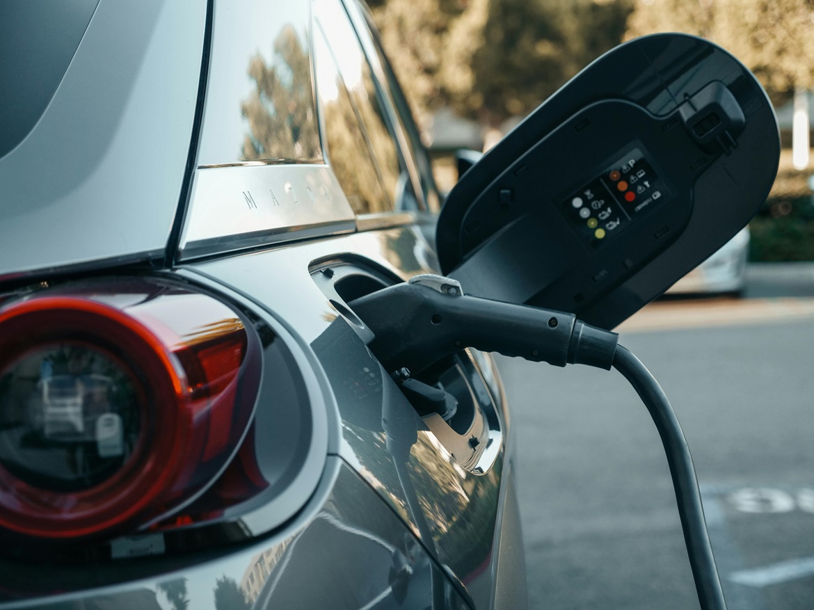EV Charging Grey car plugged into EV Charging cable
