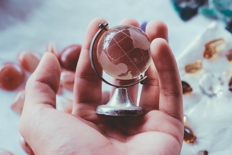 Globe in hand