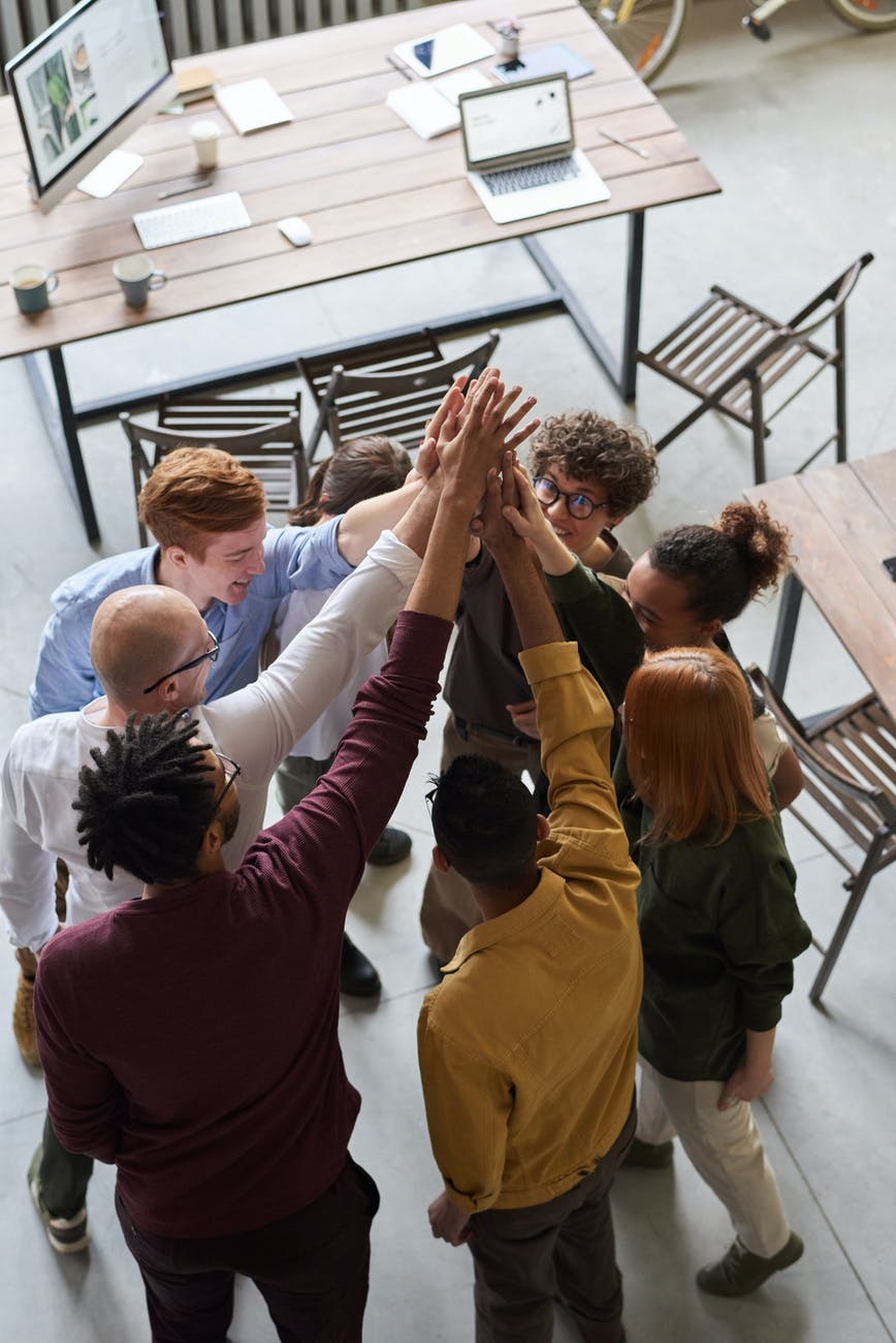 Group high fiving