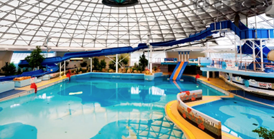Oasis leisure centre Picture of inside the Oasis Leisure Centre- showing swimming pool, slides, and inside of large dome.