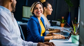 people talking in an office