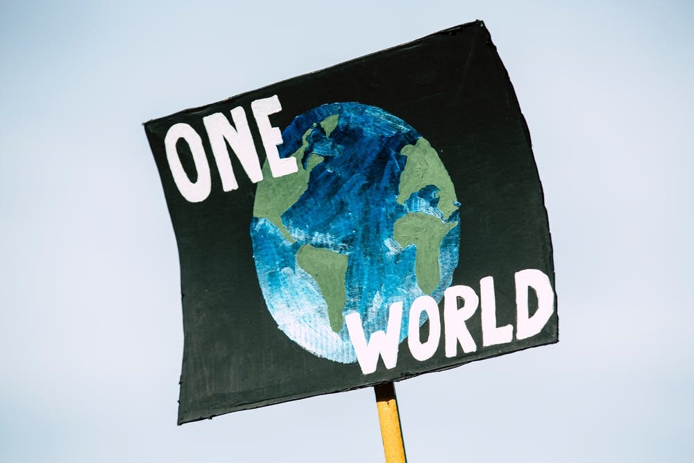 pexels-photo-3039036 one world poster