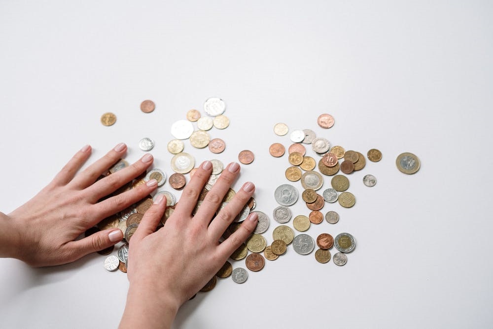 money spread by hands