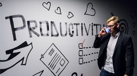 Wall-art reading 'productivity'.