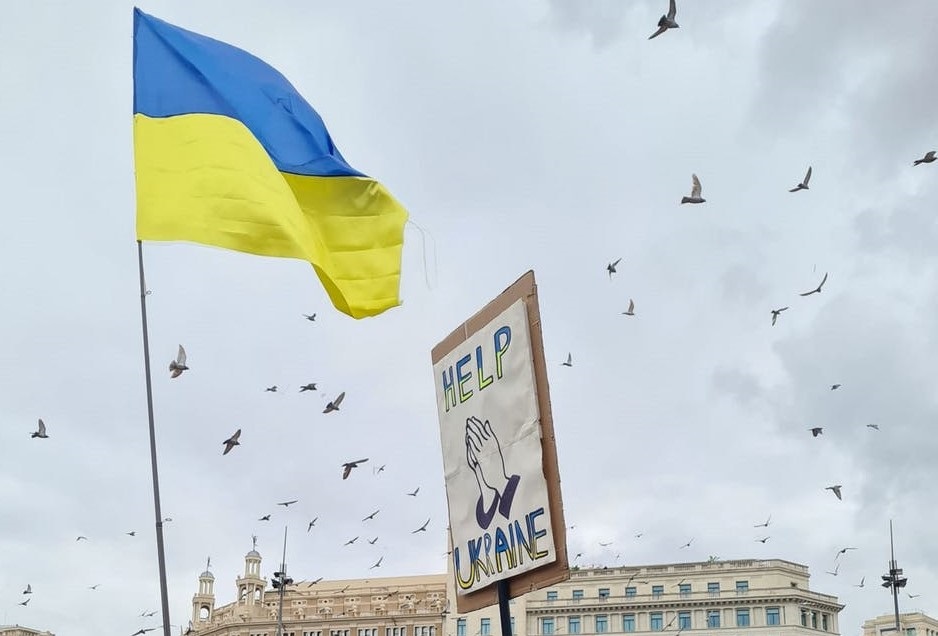 ukraine flag 2 Ukraine flag and sign reading 'Help Ukraine'