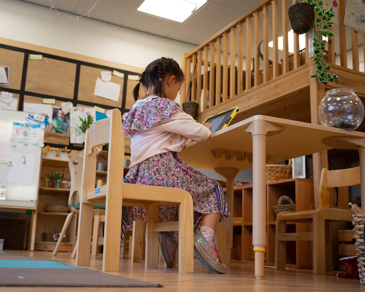girl at desk doing homework