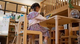 girl at desk doing homework